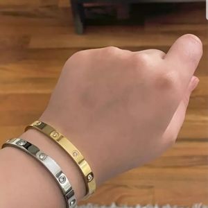 SILVER STAINLESS STEEL LOVE BRACELET